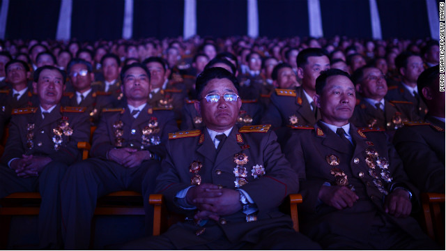North Korean military personnel watch a performance in Pyongyang in April 2012.