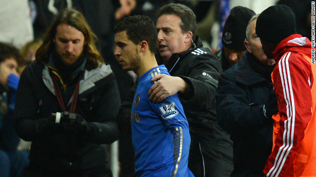 Chelsea's Eden Hazard is led away after been sent off during Chelsea's match in Swansea.