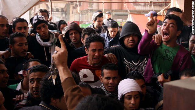 Egyptians react after the sentencing in Port Said on January 26.