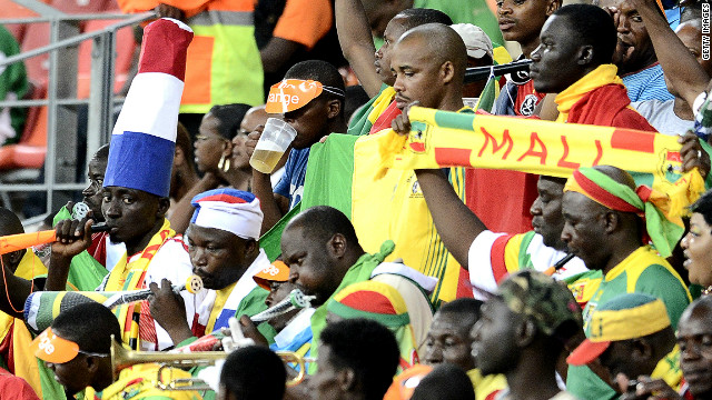 Mali football fans, some significantly sporting hats in French colors, follow their team at the Nations Cup in South Africa. 