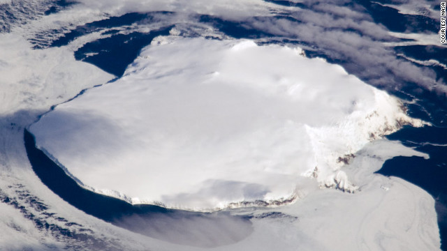 Bouvet is almost entirely covered by a glacier. Its nearest neighbor is Antarctica, 1,000 miles to the south. 