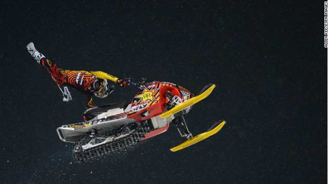 A photo of Caleb Moore's performance in the Snowmobile Freestyle Final during X Games Aspen 2013.