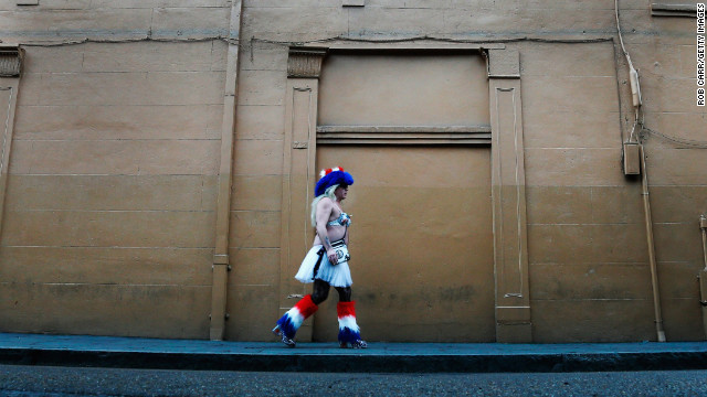 A man walks down the street in the French Quarter on January 28.