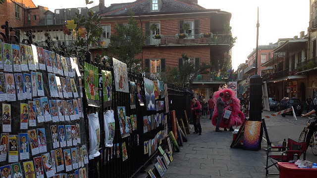 Artwork awaits Mardi Gras and Super Bowl visitors in the French Quarter.