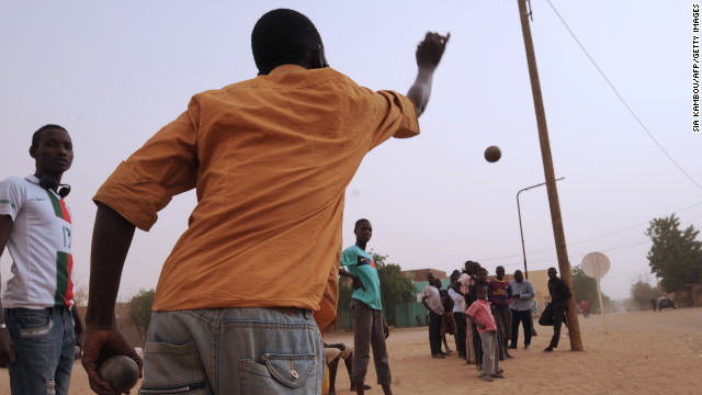Men play boules, a game that was forbidden under Islamist rule. on January Wednesday, 30, in Gao, Mali. Gao, once a key Islamist stronghold, was retaken on January 26 by French and Malian troops.