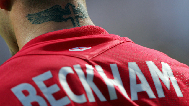 Beckham acts as England's captain during the 2004 European Nations Championship football match against Croatia in Lisbon, Portugal.