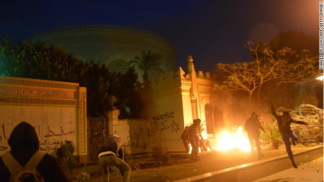 The entrance of Egypt's presidential palace in Cairo is in flames Friday, February 1, as protesters battle security forces. Egypt has been embroiled in violence after a series of events last week. There were protests on the two-year anniversary of the uprising against Hosni Mubarak's former regime and deadly clashes after a judge sentenced 21 people to death over a 2012 soccer riot.