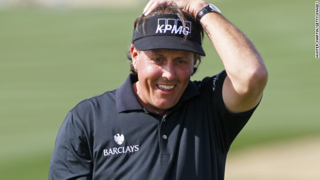 The look on Phil Mickelson's face says it all as his putt for a 59 at the Phoenix Open lips out.