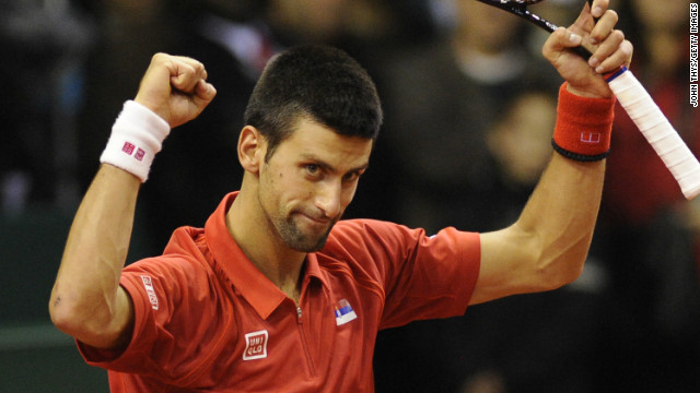 Novak Djokovic celebrates his straight sets victory over Olivier Rochus in the Davis Cup tie in Belgium. 