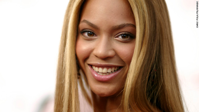 Beyonce poses for photographs before the 31st American Film Institute Life Achievement Award ceremony in Hollywood, California, on June 12, 2003.