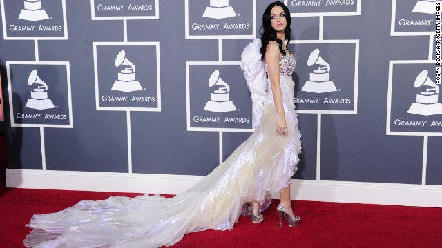 Katy Perry's 2011 red carpet look included a sparkly bra top and wings.