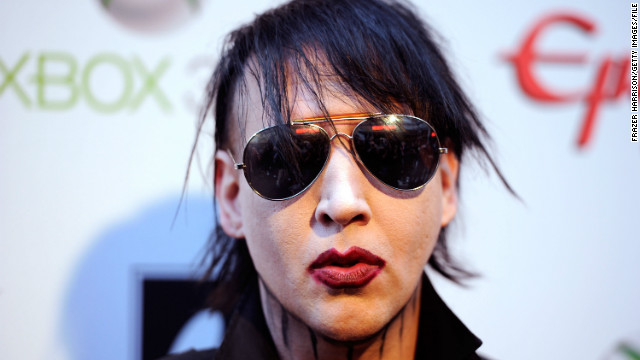 Marilyn Manson is way out there, but he did not have a rib removed so that he could more easily ... pleasure himself. 
