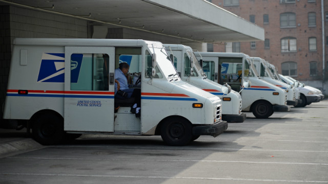 Postal Service loses less, but still in trouble