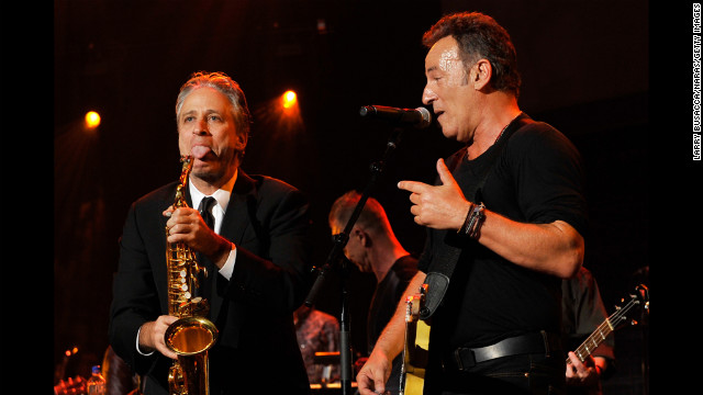 Host John Stewart and Springsteen goof around onstage.