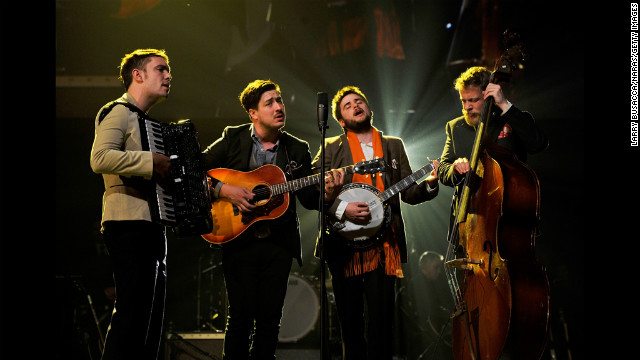 Left to right: Musicians Ben Lovett, Marcus Mumford, "Country" Winston Marshall and Ted Dwane of Mumford &amp; Sons perform "I'm on Fire."