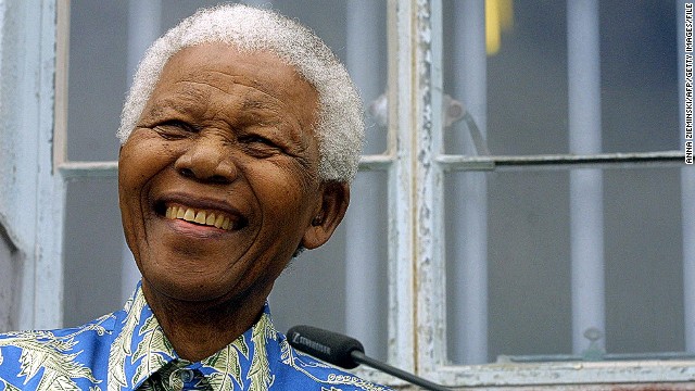 Former South African President Nelson Mandela has struggled against apartheid most of his life. Here he speaks in front of his former prison cell on Robben Island in 2003. Mandela was imprisoned in 1963 and released on February 11, 1990. 