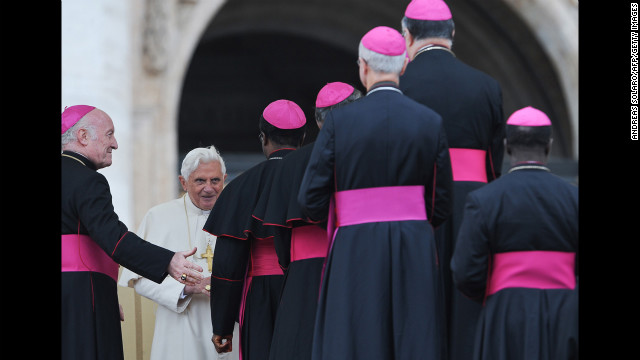 Benedict talks with bishops in Saint Peter's Square at the Vatican after his weekly general address in November 2009. 