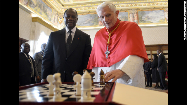 Benedict looks at a chess game with Ivory Coast President Alassane Ouattara during a private audience in November 2012 at the Vatican. 