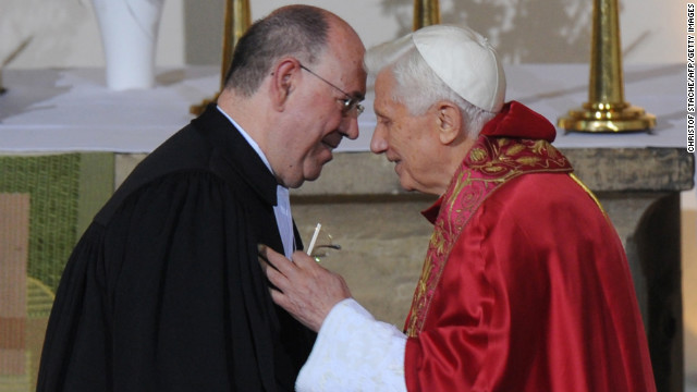 Benedict speaks with Nikolaus Schneider, praeses of the Evangelical Church in the Rhineland, before a Mass at the Augustinian monastery in Erfurt, Germany, in September 2011.