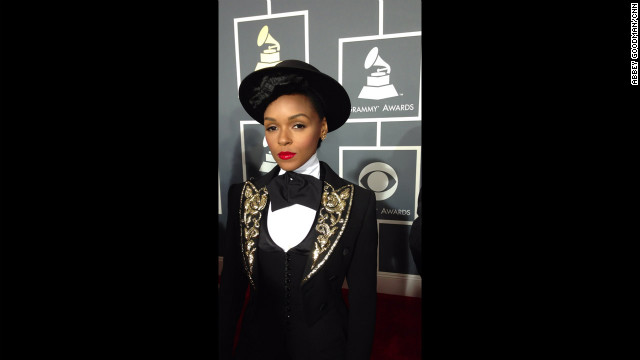 Just outside the frame is total chaos, but Janelle Monae remains perfectly poised - not to mention totally poreless. No Instagram filter was applied to this photo. 