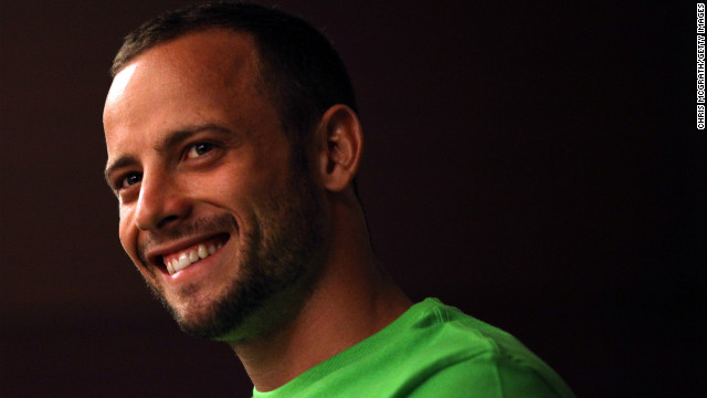 Pistorius speaks with Olympic gold medalist Michael Johnson of the United States during a media gathering prior to the 13th IAAF World Athletics Championships Daegu 2011 on August 26, 2011, in Daegu, South Korea. Pistorius was the first amputee athlete to compete at the World Athletics Championships.