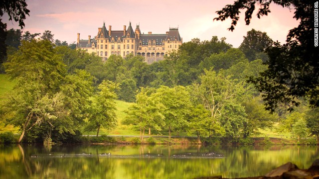 A view of the Biltmore estate from the lagoon shows the back of the house. 