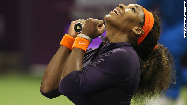 Serena Williams celebrates after claiming the victory which will send her back to the summit on Monday.