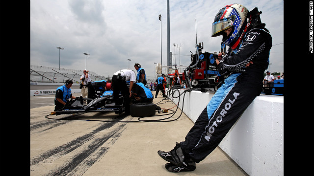 Patrick waits to get in her car during practice for the SunTrust Indy Challenge in 2007 in Richmond, Virginia.