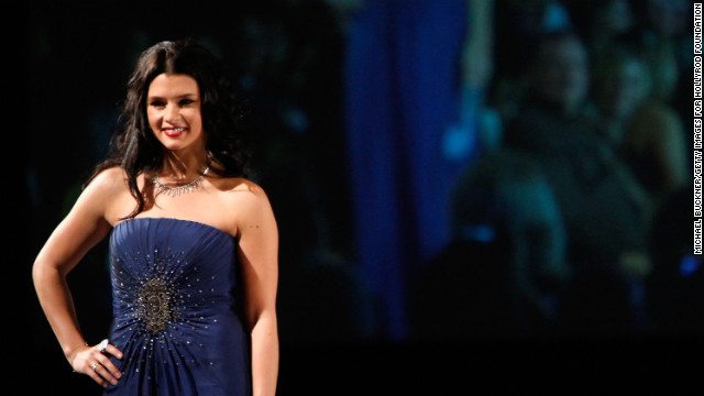 Patrick walks the runway at the 10th Annual Gridiron Glamour Show in 2008 in Scottsdale, Arizona.