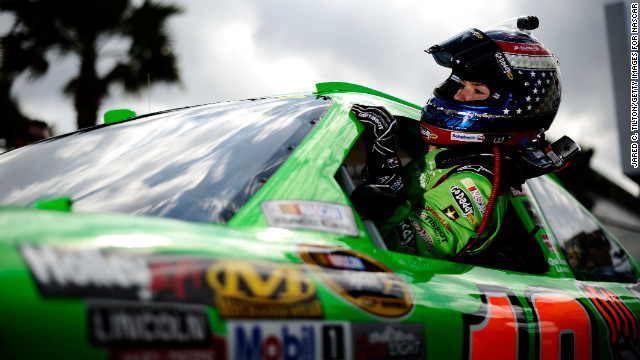 Patrick gets out of her car after qualifying for the Daytona 500 in 2012.