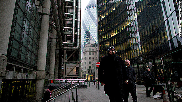 City workers leave their offices on January 25, as Britain's economy was reported to have shrank 0.3 percent in Q4 2012.