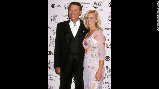 McCready attends the 33rd Annual Academy of Country Music Awards with musician Glen Campbell in April 1998 in Universal City, California. 