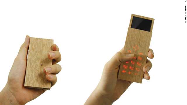 At first glance Ryan Harc's Maple Phone is nothing but a block of wood. But, sensitive to touch, it transforms into a sleek mobile phone with slide-out display, mp3 player and digital camera.