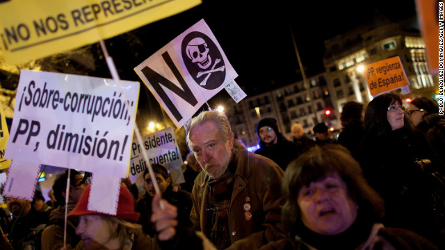 Protestors gather during a demonstration against alleged corruption scandals implicating the PP (Popular Party) on February 3 in Madrid, Spain.