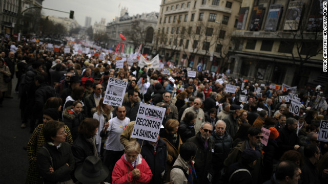 Protesters take part in a demonstration against plans to cut medical spending and privatize hospital services in Madrid of February 17. 