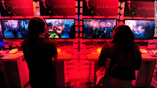 Gaming fans play PlayStation 3's Hitman Absolution at the E3 videogame extravaganza in Los Angeles on June7, 2012. Some 45,700 video game industry professionals, investor analysts, retailers and journalists from over a hundered countries attended the expo.