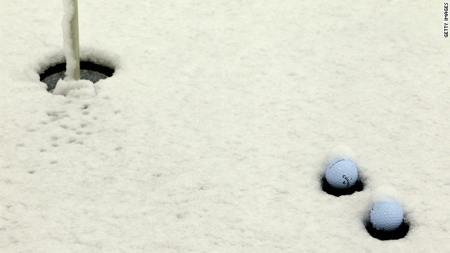 Snow covers a practice putting green in Arizona on the opening day of the Match Play Championships