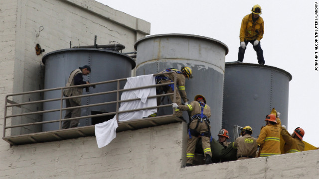 Body in hotel tank: Cause may take weeks