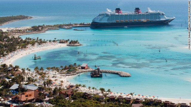 The Disney Dream is shown arriving at Castaway Cay, Disney's private island in the Bahamas.