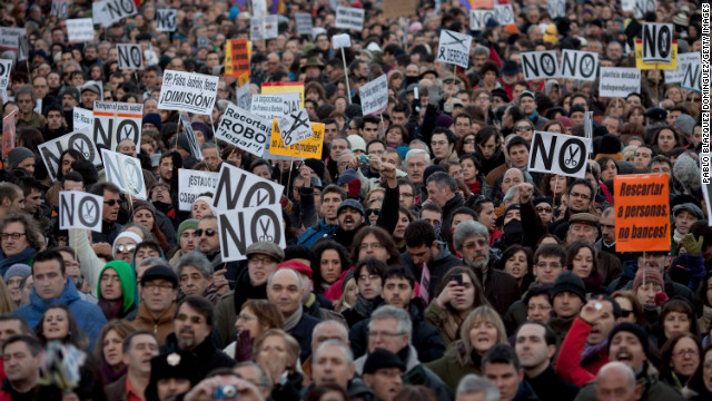 Demonstrators shout slogans at Neptuno Square during a march made by thousands of people on Saturday, February 23 in Madrid.