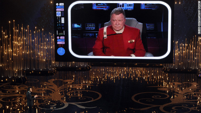 MacFarlane talks to William Shatner on the video screen during his opening. Shatner gives the host tips to make sure tomorrow's headlines don't read "worst Oscar host ever."