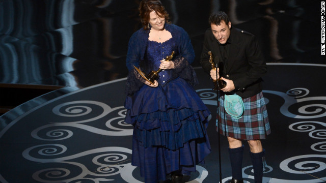 "Brave's" Brenda Chapman and Mark Andrews accept the award for best animated feature film. Andrews wore a kilt in honor of the Scottish Highlands-set film, while Chapman thanked her daughter for inspiring the story.