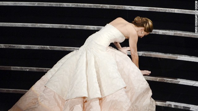 Jennifer Lawrence trips on her way to the stage after winning best actress for "Silver Linings Playbook."