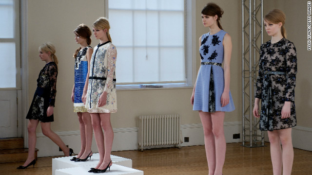 Models wear designs at the Huishan Zhang presentation during London Fashion Week Fall/Winter 2013/14 on February 18.