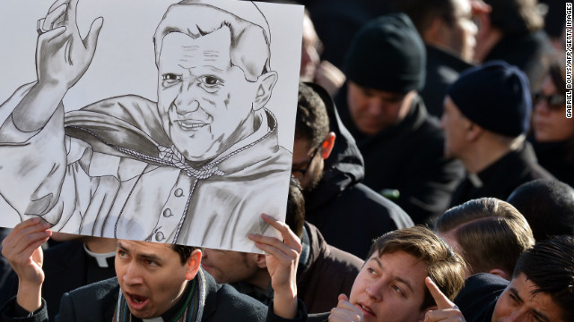 Many people brought placards and signs -- like this one with a drawing showing Pope Benedict XVI.
