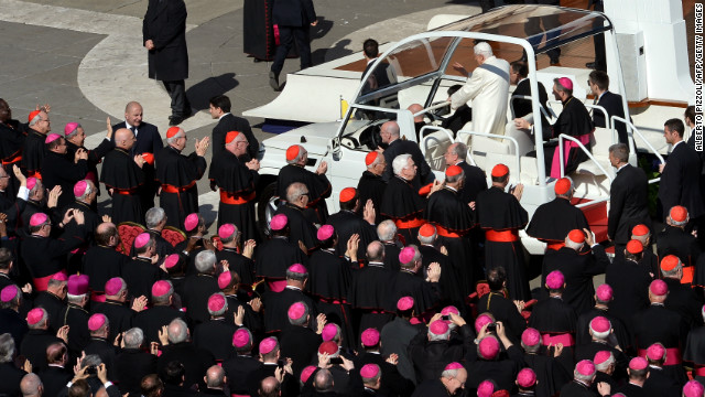 Pope Benedict XVI arrives on St Peter's square for his last weekly audience on February 27, 2013 at the Vatican.