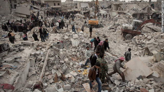 Syrians search for survivors and bodies after the Syrian regime attacked the city of Aleppo with missiles on February 23.