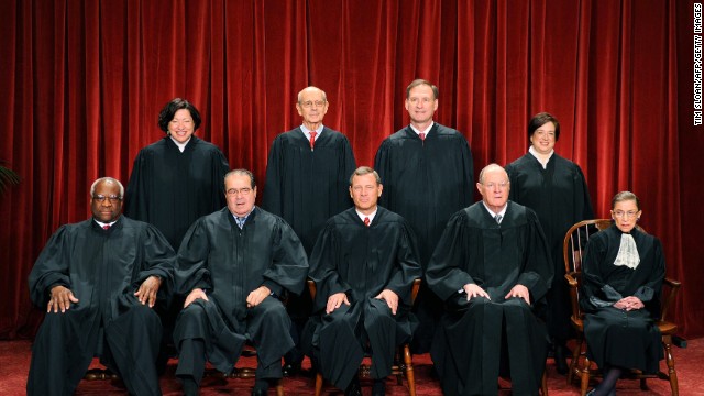 The justices of the U.S. Supreme Court sit for their official photograph on October 8, 2010, at the Supreme Court. Front row, from left: Clarence Thomas, Antonin Scalia, Chief Justice John G. Roberts, Anthony M. Kennedy and Ruth Bader Ginsburg. Back row, from left: Sonia Sotomayor, Stephen Breyer, Samuel Alito Jr. and Elena Kagan.