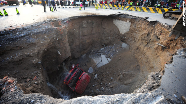 Construction on a subway line caused a huge sinkhole to form in a road in Beijing in April 2011.