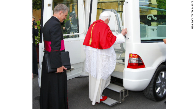 This picture shows the way the pope enters a Popemobile. The back door is opened, revealing a small staircase to help him board smoothly.(September 17, 2010 in London, England)